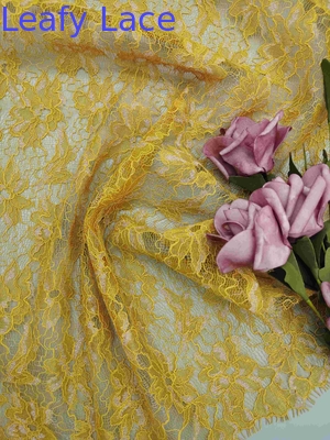 Soft Handfeel de alta calidad patrón floral dorado tejido de encaje metálico con pestañas con cara de mujer vestido de moda