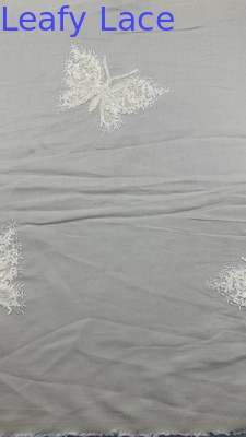 Tejido de encaje bordado de mariposa elegante y duradero para traje textil doméstico