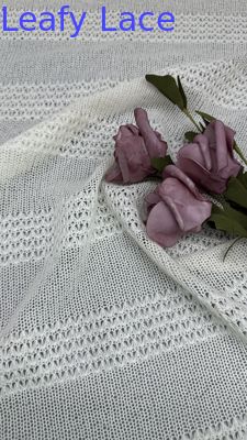 2025 Tejido de encaje de estiramiento para vestidos y prendas de vestir Tulle Tipo de tira blanda patrón por el patio