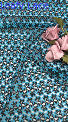 Tejido bordado de algodón azul y blanco de punto hueco para nueva colección para vestidos
