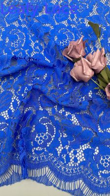 Tela bordada de encaje azul con patrones florales y corte láser para vestidos de fiesta y ropa