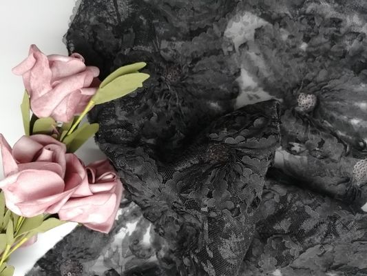 El partido base del bordado ata la tela negra del Applique de la lentejuela 3D