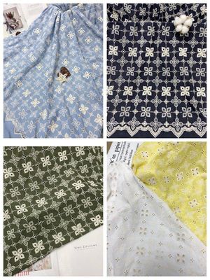 100 yardas de algodón floral bordaron la tela de la ropa de los niños de la tela del ojeteador